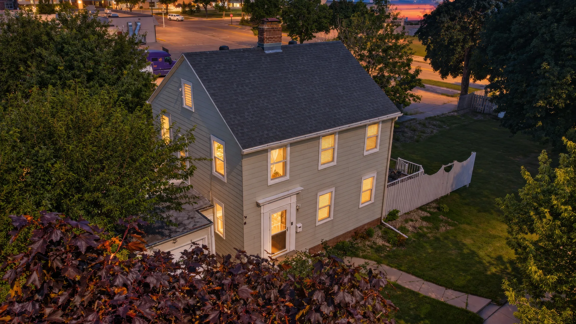 The same aerial view of 608 9th Street, Worthington, edited into a virtual twilight